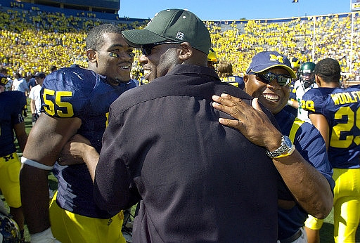 Brandon Graham (55), Ron English, and Jamie Morris