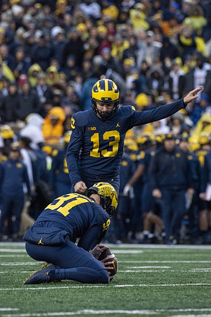 Brad Robbins (91) and Jake Moody (13)