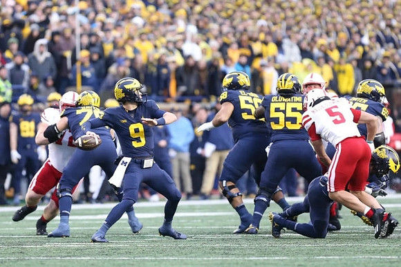Ryan Hayes (76), J.J. McCarthy (9), Giovanni El-Hadi (58), Olusegun Oluwatimi (55), and Zak Zinter (65)