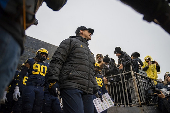 Jim Harbaugh and Mike Morris (90)