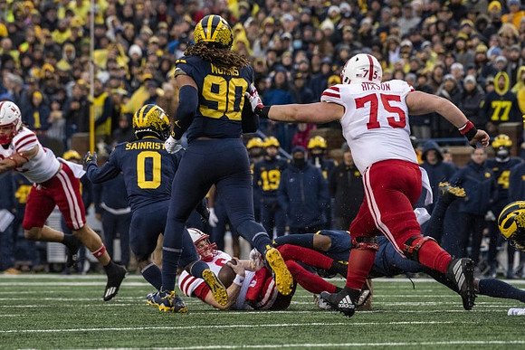 Mike Sainristil (0) and Mike Morris (90)
