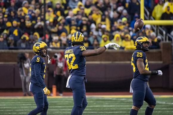 DJ Turner (5), Jaylen Harrell (32), and Junior Colson (25)