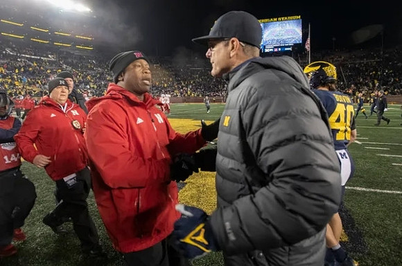 Nebraska Head Coach Mickey Joseph and Jim Harbaugh