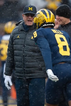 Jim Harbaugh and Ronnie Bell (8)