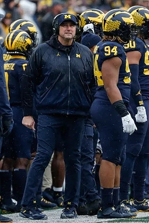 Mike Sainristil (0), Mike Elston, Kris Jenkins (94), and Mike Morris (90)