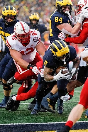 Karsen Barnhart (52), Joel Honigford (84), and Blake Corum (2)