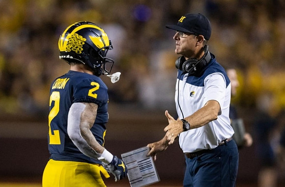 Blake Corum (2) and Jim Harbaugh