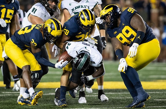 Deuce Spurlock (15), German Green (33), Joey Velazquez (29), and Cam Goode (99)
