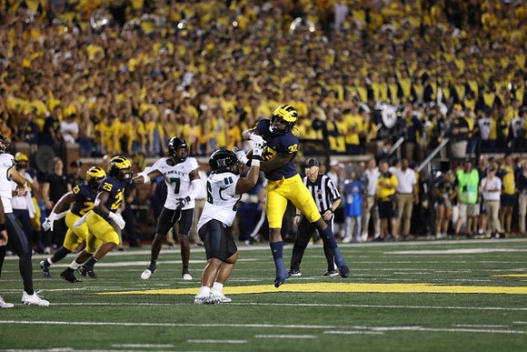 Michael Barrett (23), Junior Colson (25), and Jaylen Harrell (32)