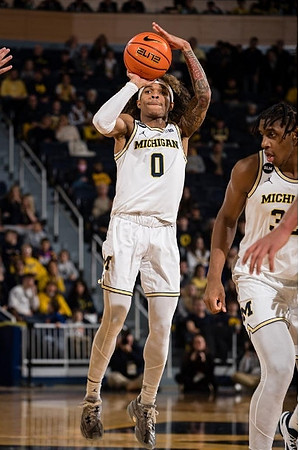 Dug McDaniel (0) and Tarris Reed Jr. (32)