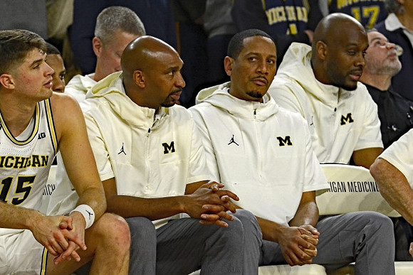 Joey Baker (15), Saddi Washington, and Howard Eisley