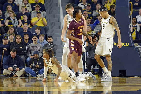 Dug McDaniel (0), Hunter Dickinson (1), and Terrance Williams II (5)