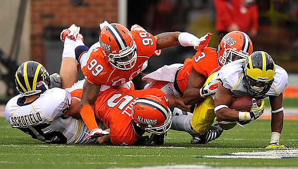 Michael Schofield (75) and Jeremy Gallon (10)
