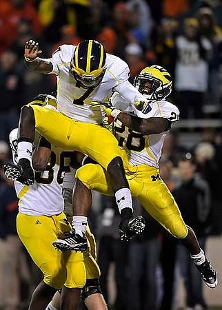 Kevin Koger (86), Devin Gardner (7), and Fitzgerald Toussaint (28)