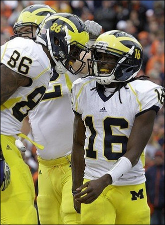 Kevin Koger (86), Mark Huyge (72), and Denard Robinson (16)