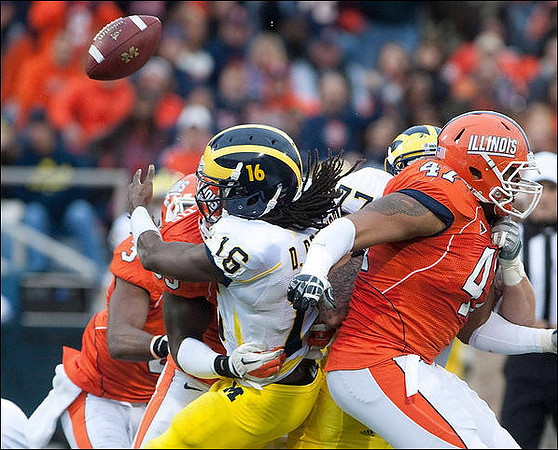 Denard Robinson (16) and Taylor Lewan (77)