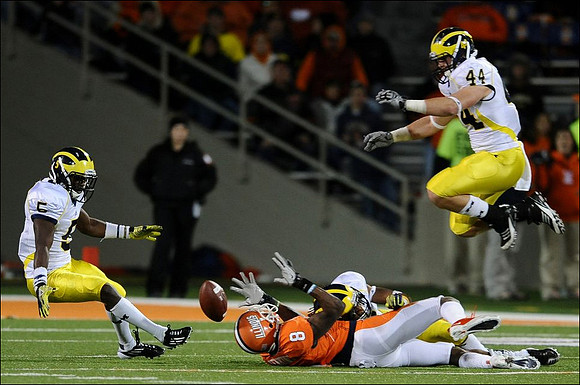 Courtney Avery (5), J.T. Floyd (8), and Desmond Morgan (44)
