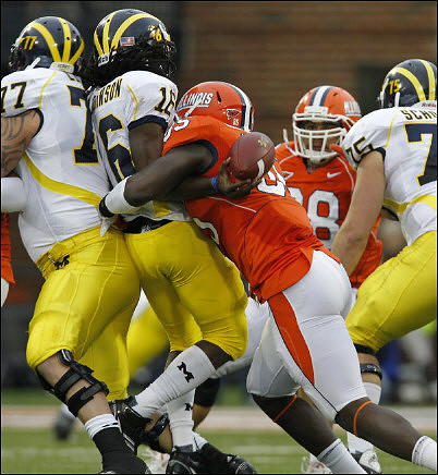 Taylor Lewan (77), Denard Robinson (16), and Michael Schofield (75)