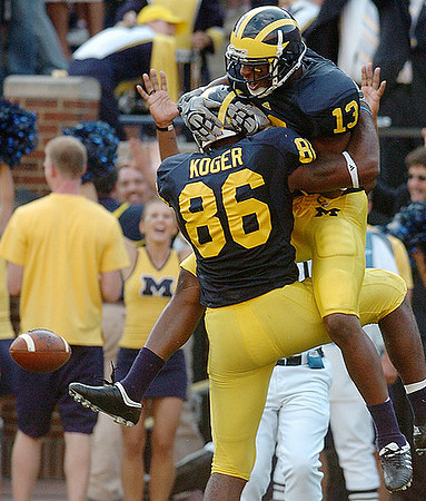 Kevin Koger (86) and Greg Mathews (13)