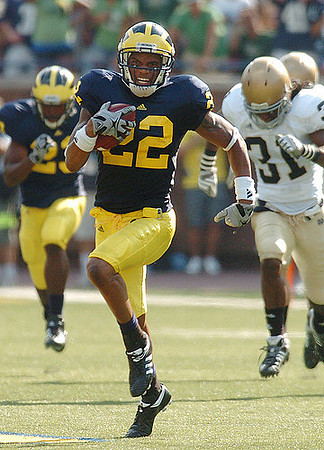 Darryl Stonum (22) and Floyd Simmons (23)