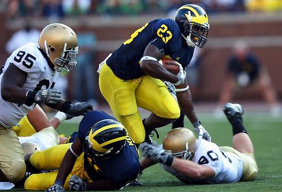 Carlos Brown (23) and Kevin Koger (86)