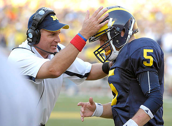 Rich Rodriguez and Tate Forcier (5)