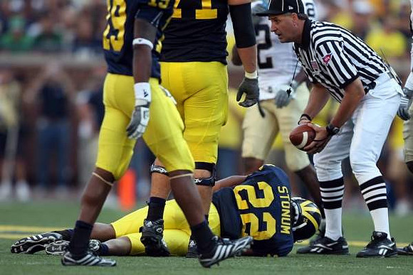 Troy Woolfolk (29), Mark Ortmann (71) and Darryl Stonum (22)