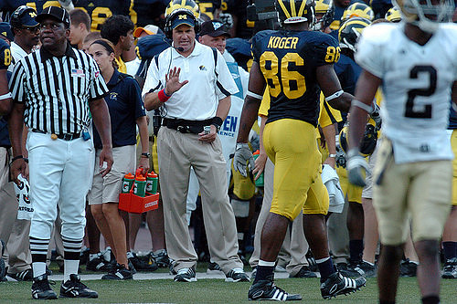 Rich Rodriguez and Kevin Koger (86)