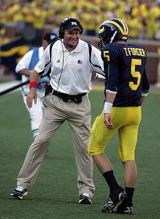 Rich Rodriguez and Tate Forcier (5)