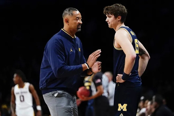 Juwan Howard and Joey Baker (15)