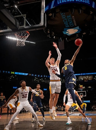 Dug McDaniel (0) and Tarris Reed Jr. (32)