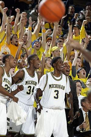 Jevohn Shepherd (22), DeShawn Sims (34), and Manny Harris (3)