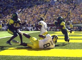 Steve Breaston (15) and Jason Avant (8)