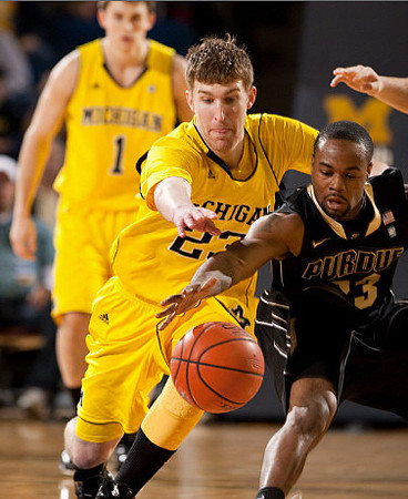 Evan Smotrycz (23) and Stu Douglass (1)
