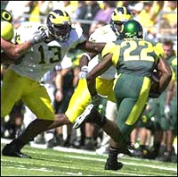 Larry Stevens (13) and Pierre Woods (99)