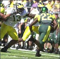 Larry Stevens (13) and Pierre Woods (99)