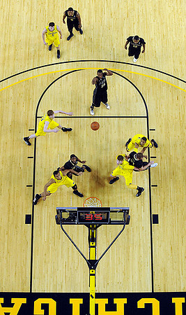 Jordan Morgan (52), Matt Vogrich (13), Stu Douglass (1), Darius Morris (4), and Evan Smotrycz (23)