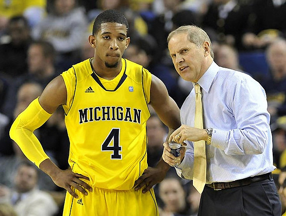Darius Morris (4) and John Beilein