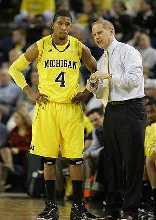 Darius Morris (4) and John Beilein