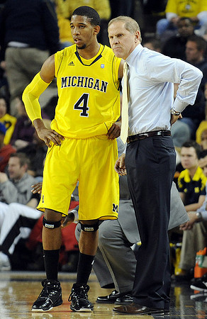 Darius Morris (4) and John Beilein