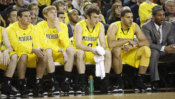 Josh Bartelstein (20), Blake McLimans (22), Zack Novak (0), Jordan Morgan (52), and LaVall Jordan