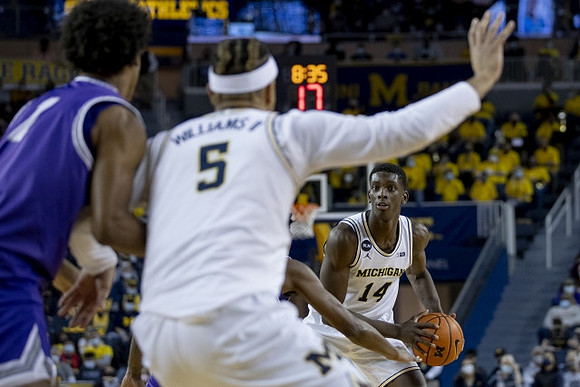 Terrance Williams II (5) and Moussa Diabate (14)