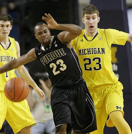 Stu Douglass (1) and Evan Smotrycz (23)