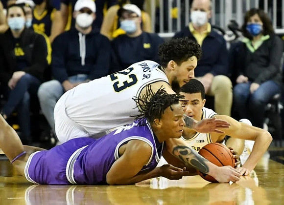 Brandon Johns Jr. (23) and Caleb Houstan (22)
