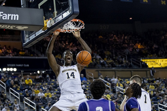 Moussa Diabate (14) and Hunter Dickinson (1)