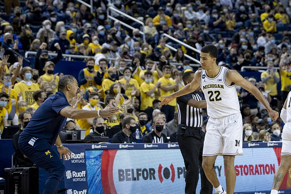 Juwan Howard and Caleb Houstan (22)