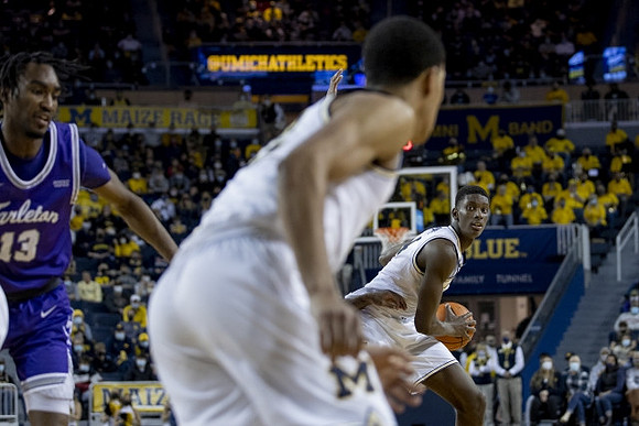 Caleb Houstan (22) and Moussa Diabate (14)