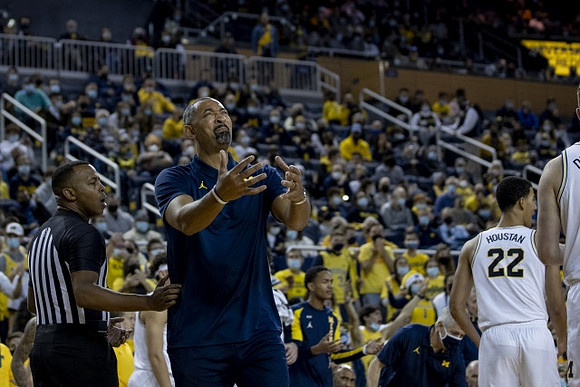 Juwan Howard and Caleb Houstan (22)