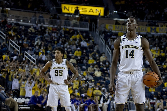 Eli Brooks (55) and Moussa Diabate (14)