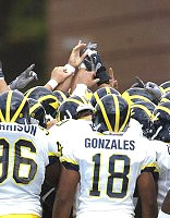 Larry Harrison (96) and Jermaine Gonzales (18)